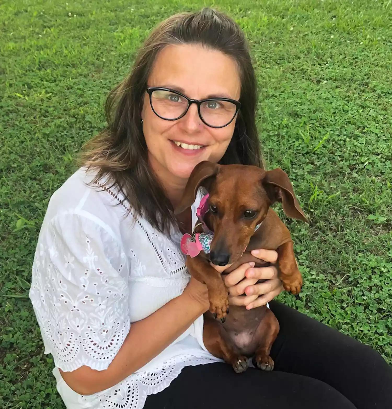 Jodi holding Freya, her rescue dog