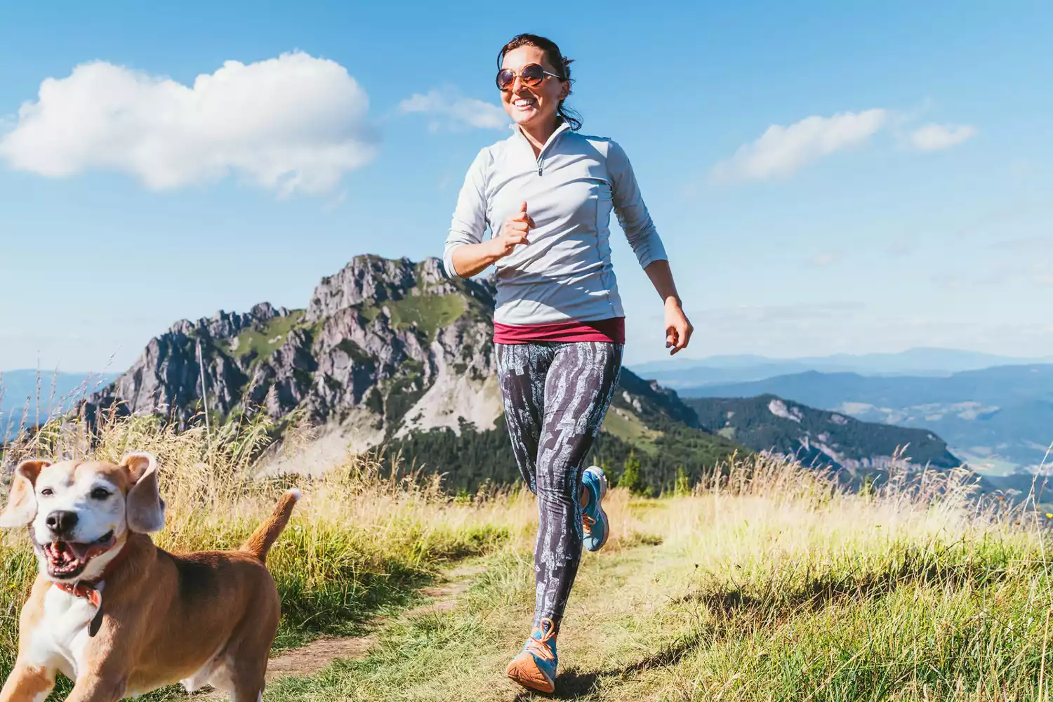 woman running with her dog