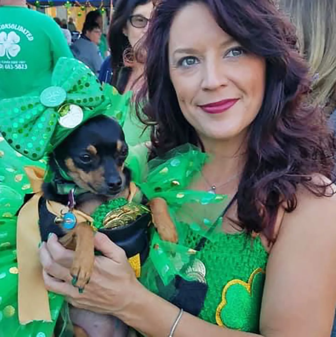 Presley the dog and owner Rebecca in St. Patrick's Day outfits